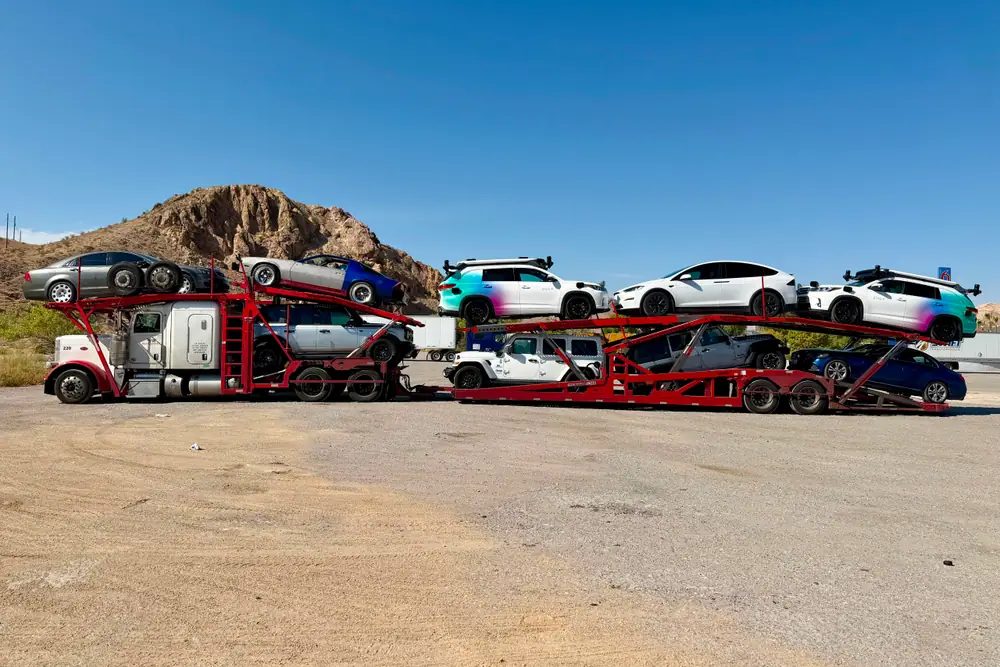 An Onway car hauler loaded with a full run of vehicles in the desert Southwest